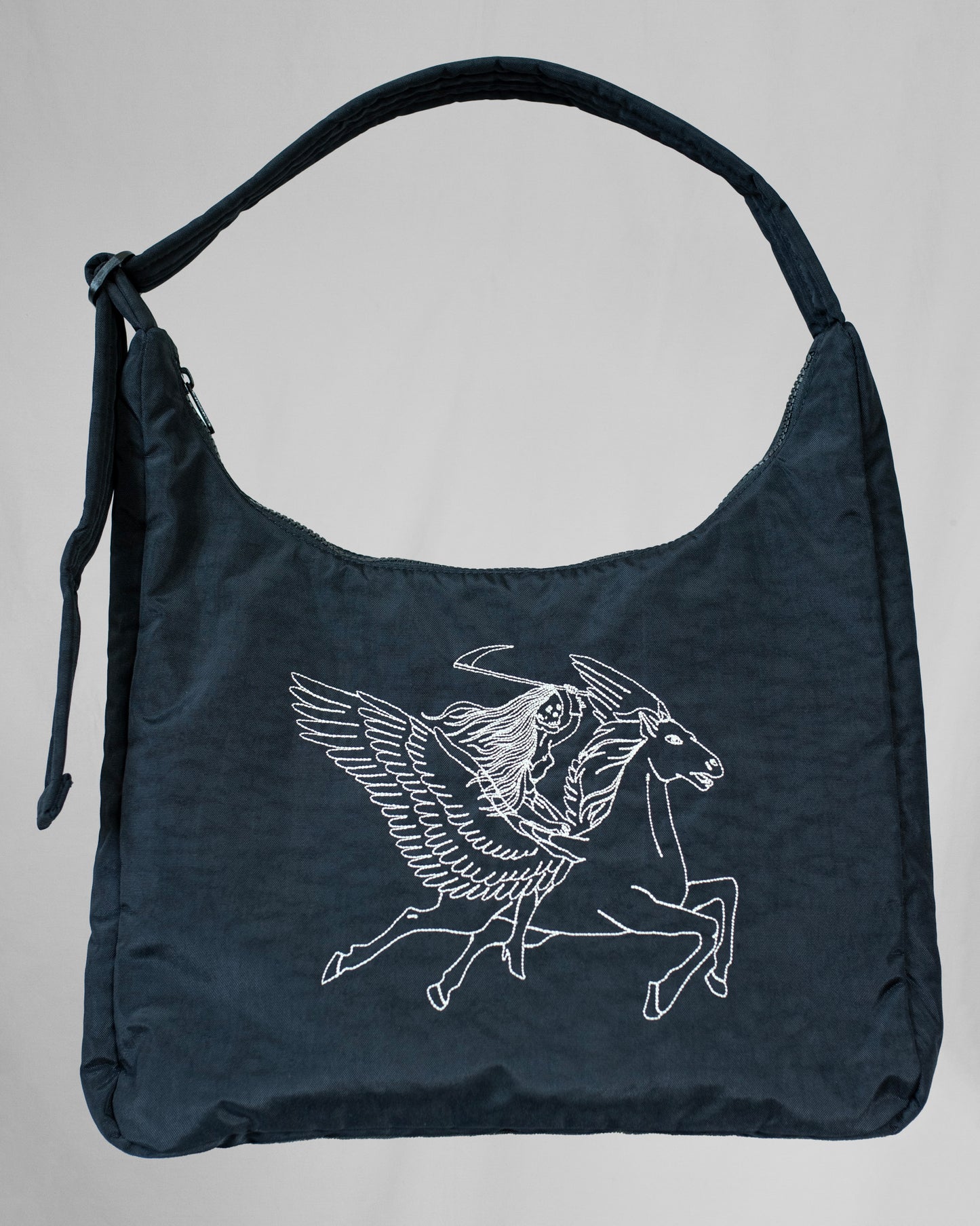 Black bag with a white Pegasus design on a gray background