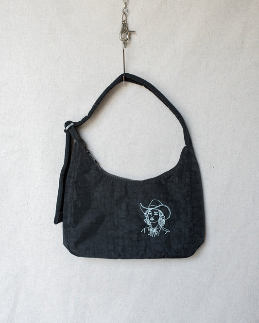 Small black shoulder bag purse with a cowgirl embroidery