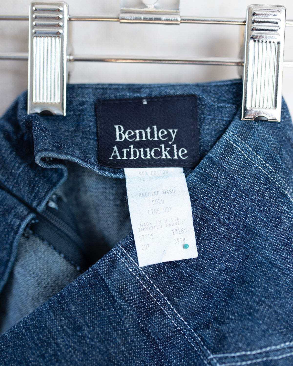 Detail of the denim skirt tag.