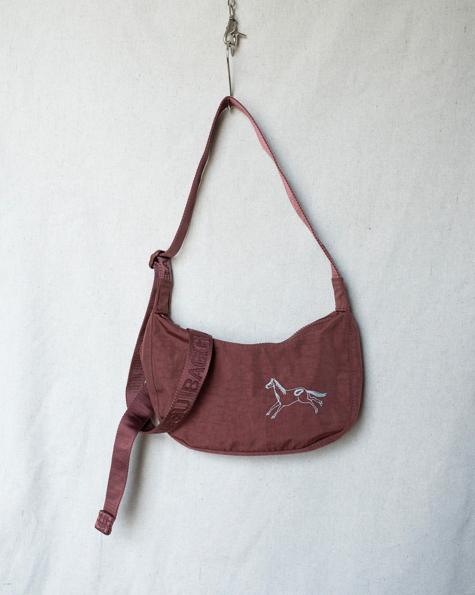 Small crossbody bag with horse embroidery