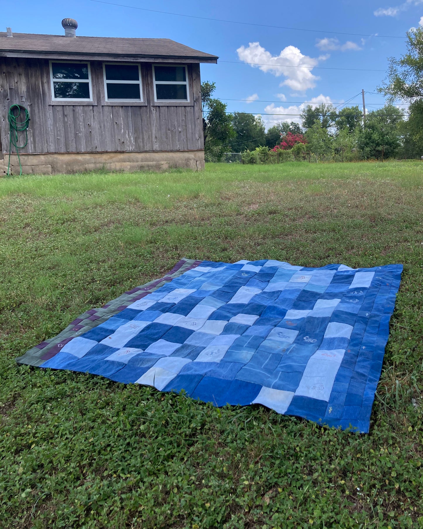 DOUBLE SIDED DENIM QUILT WITH CUSTOM EMBROIDERIES