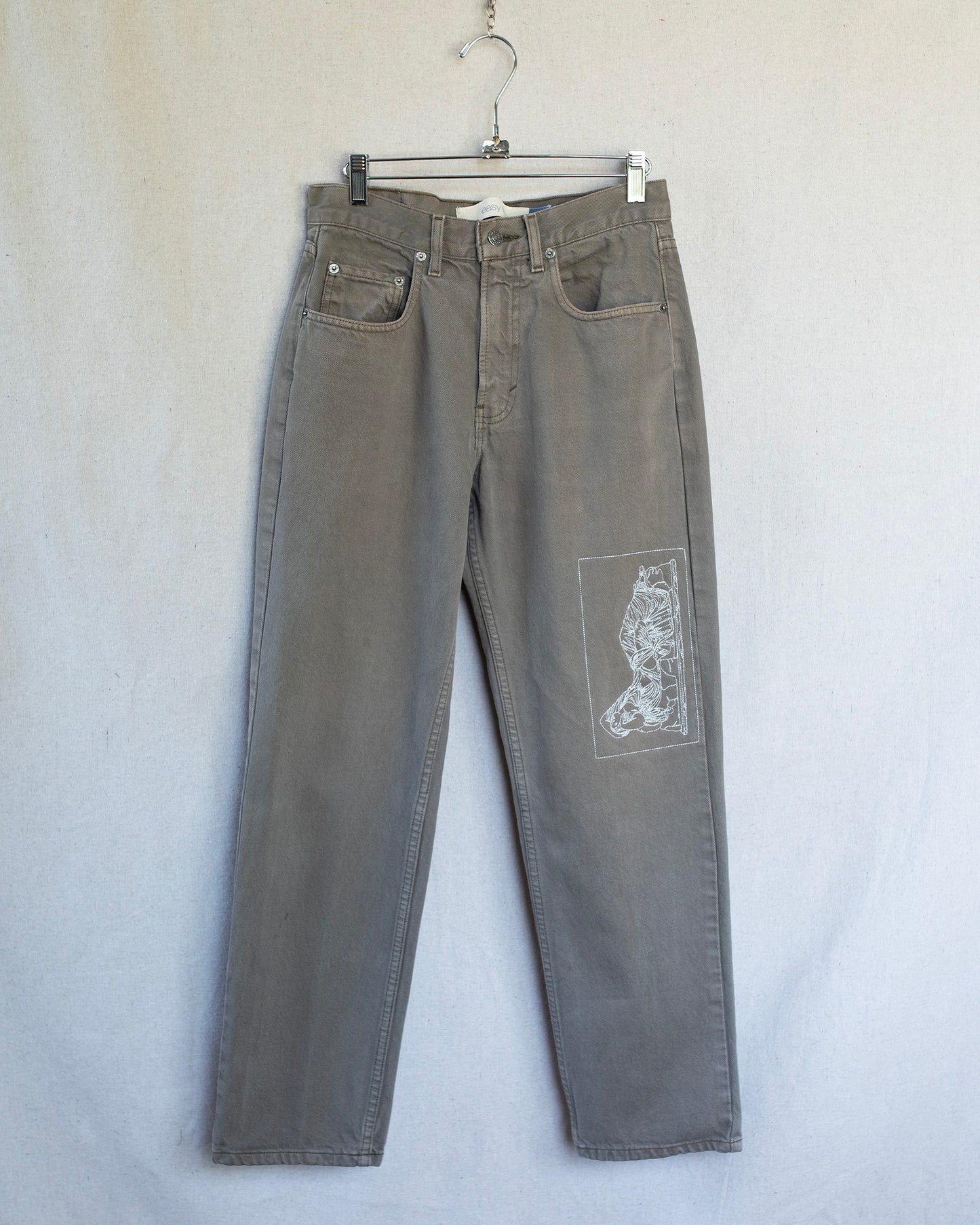 Brown gap jeans with roman statue embroidery on leg